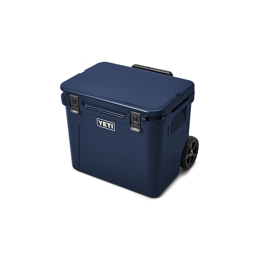 https://allweathergoods.com/cdn/shop/products/W-220022_site_studio_Hard_Coolers_Roadie_60_Navy_3qtr_Front_Handle_Down_7792_Primary_B_2400x2400_png@2x.png?v=1678378855